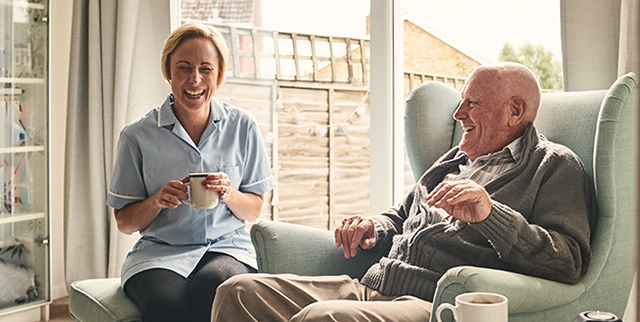 senior with companion and aid